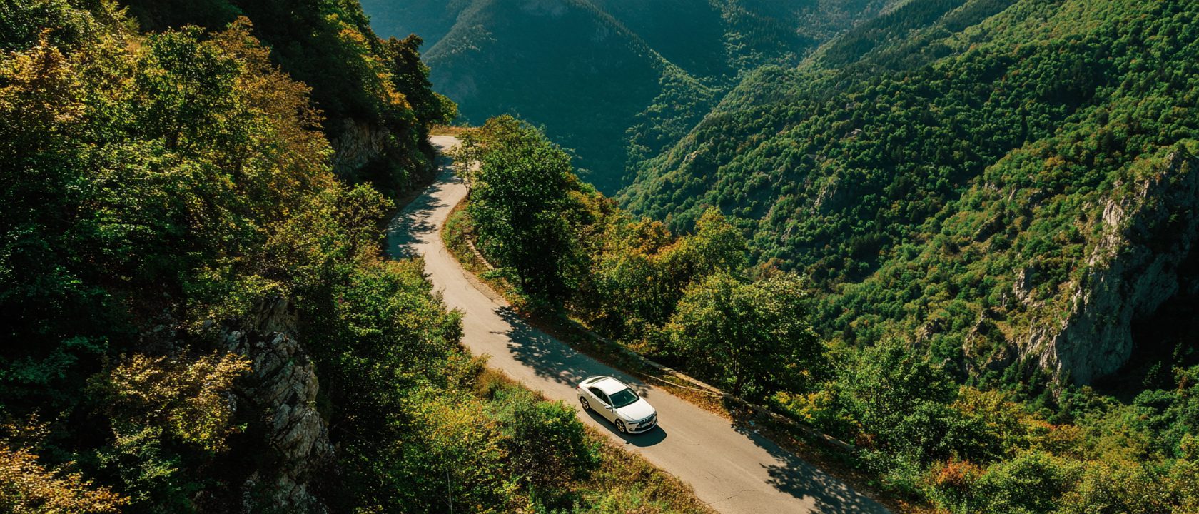 Car on a mountain road in the Western Balkans